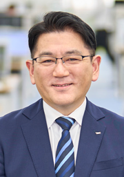 代表取締役社長　飯塚 真規